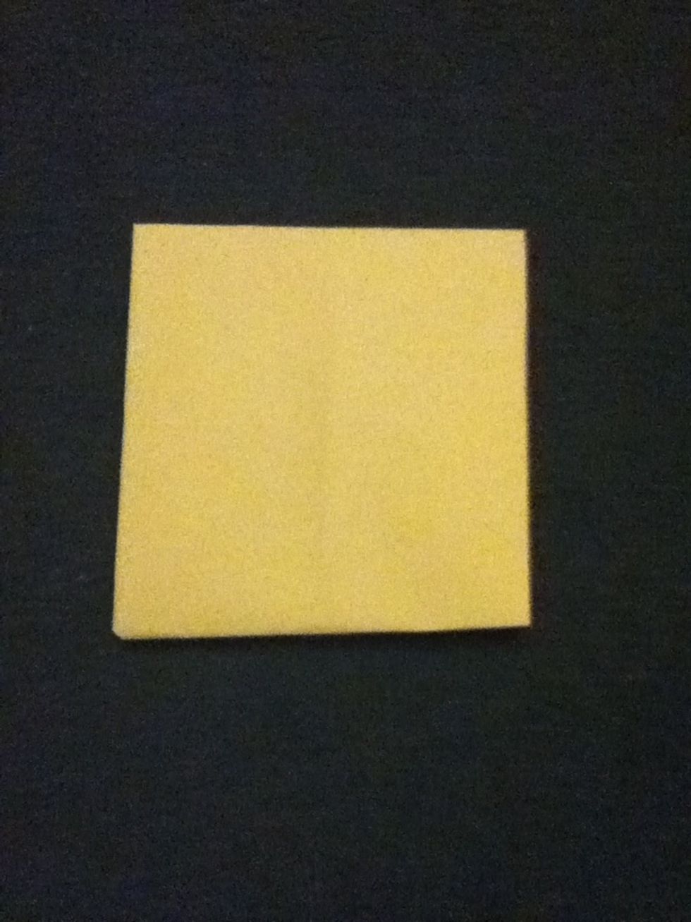 Flip it over and fold all the corners into the middle again