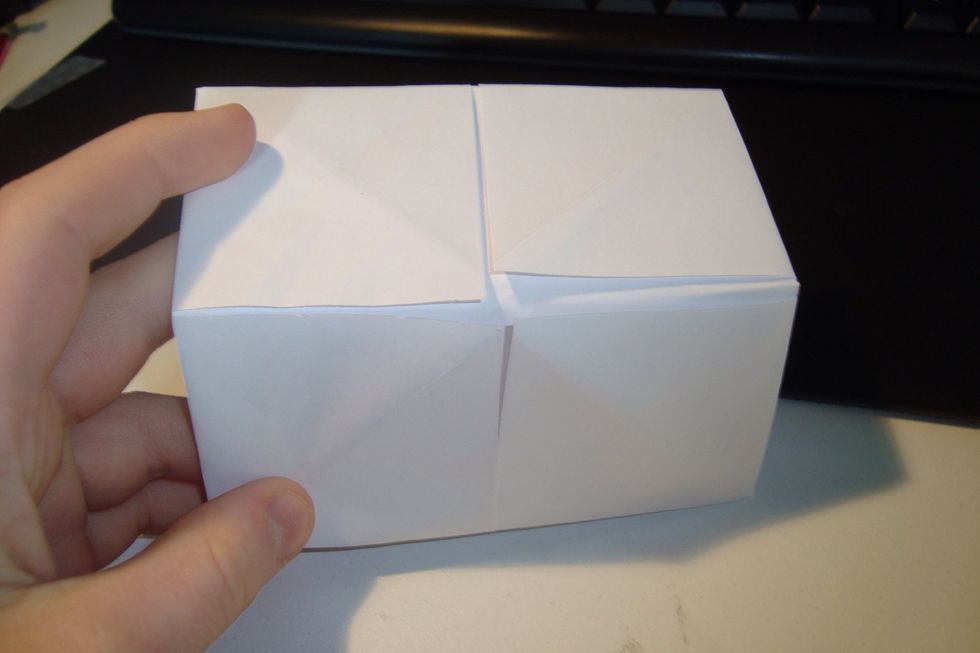 Flip it over and fold it like a sandwich again, for each side.