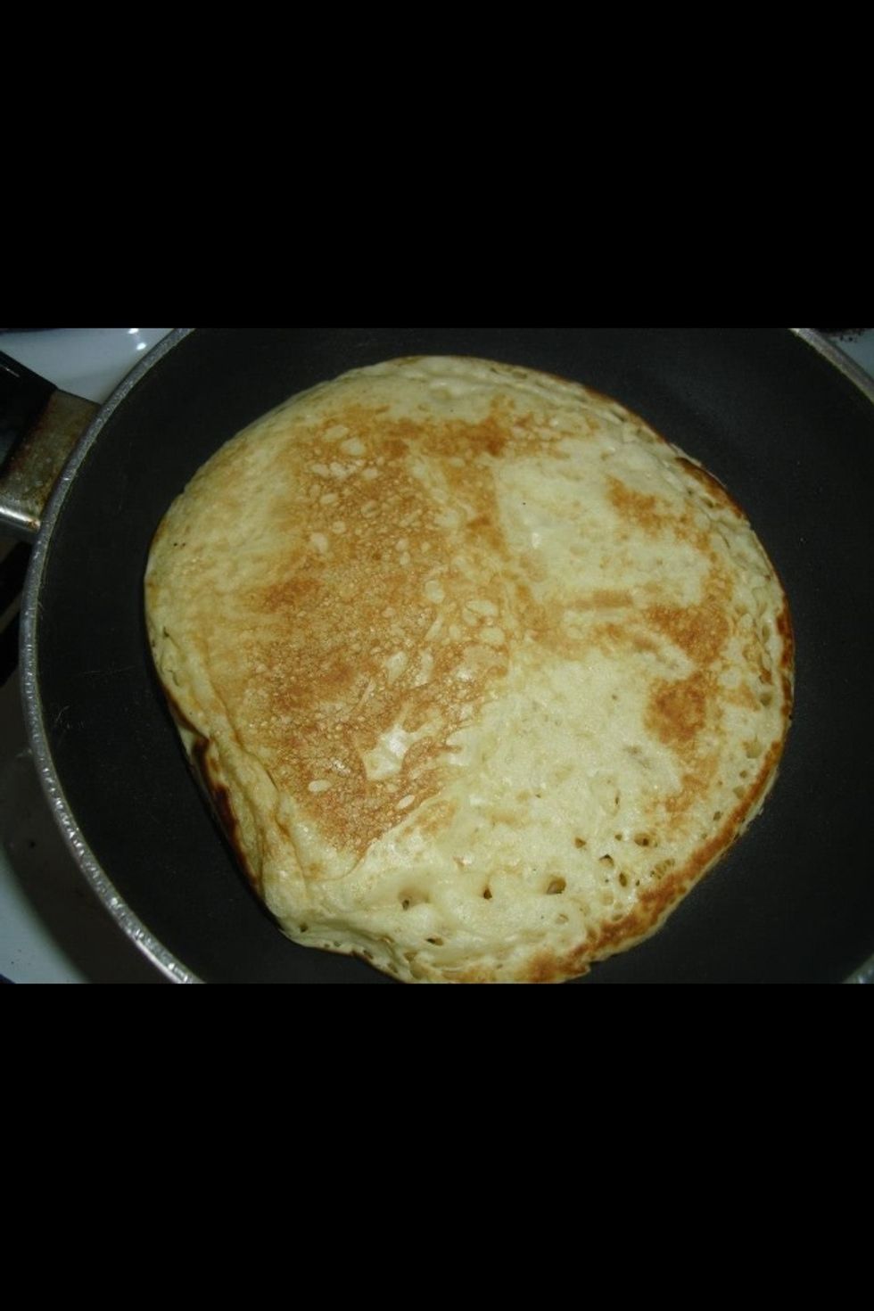 Flip it over and let the other side cook for about a minute or until golden brown.