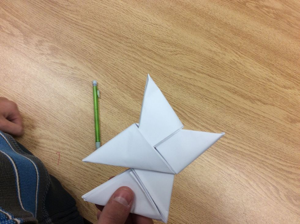 Flip it over and stick the end into the flaps