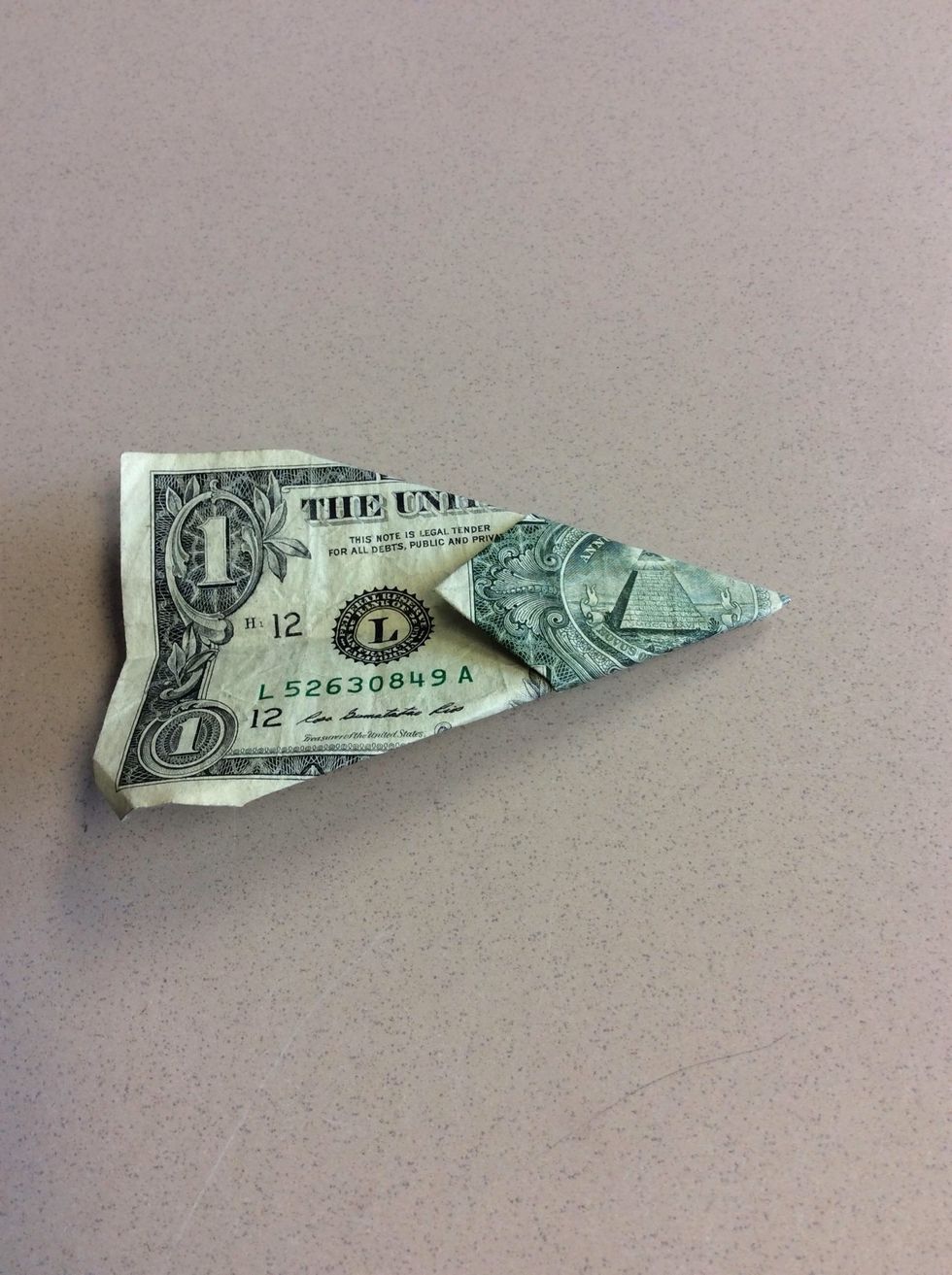 Flip it over, but this time you shouldn't be Albee to see the face.