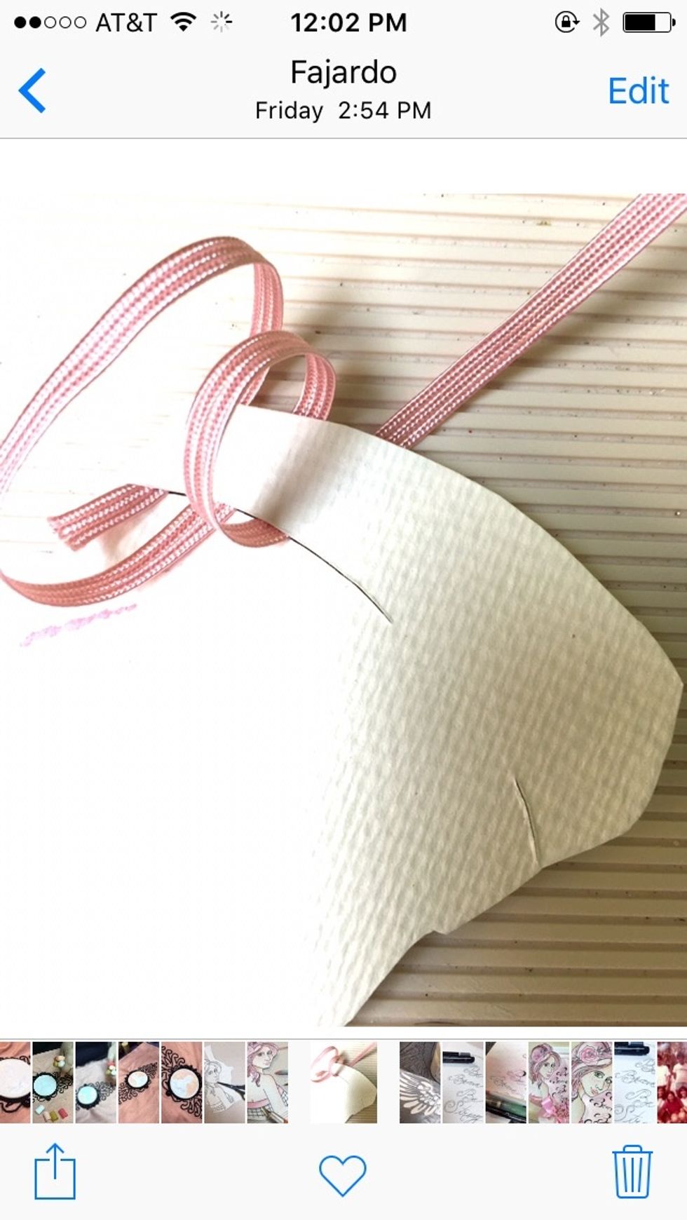 Flip it to the back and weave a fabric dress for her using your braid cording!