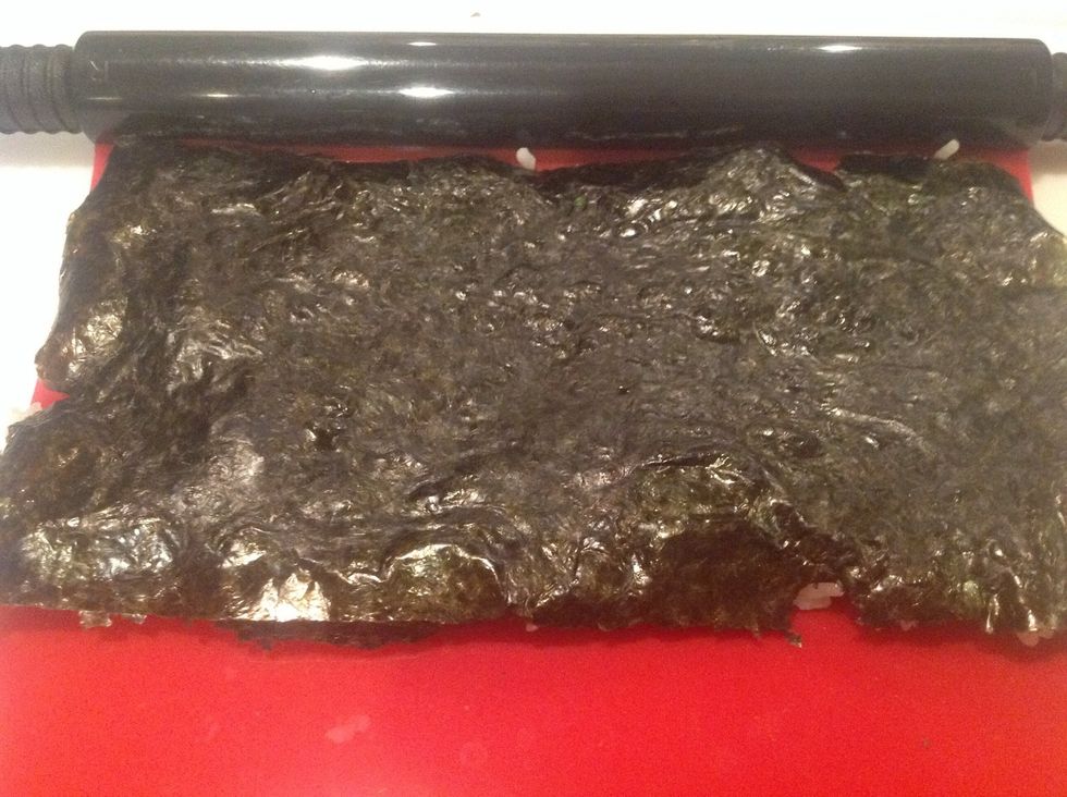 Flip nori sheet over