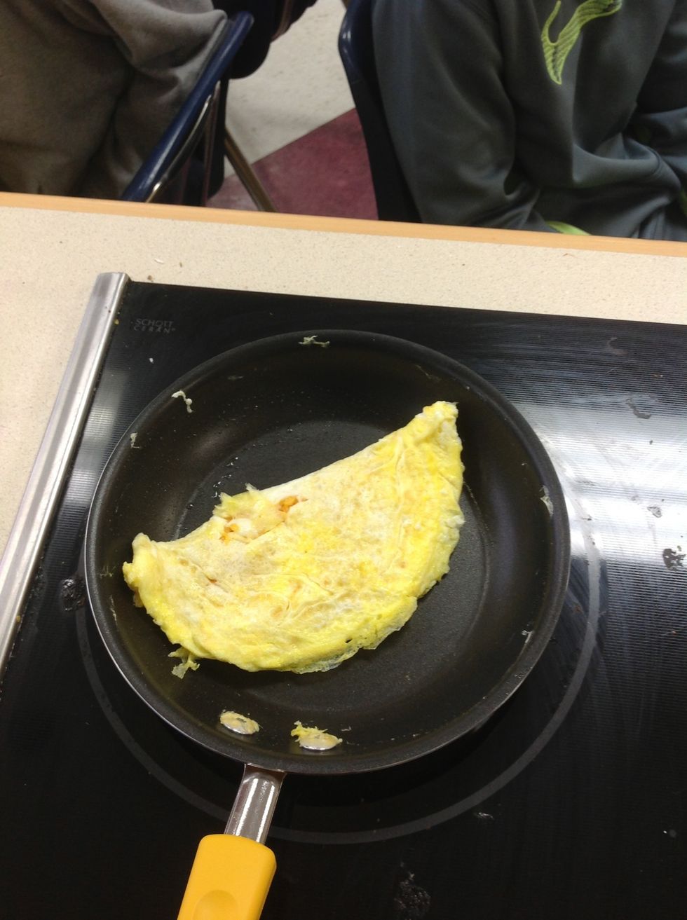 Flip one side with a rubber spatula