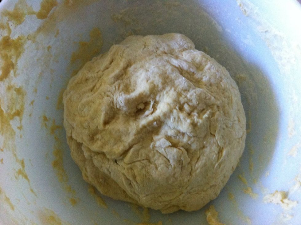 Flip out onto a floured board and knead for about 4-6 minutes. If dough feels sticky keep adding flour while you knead. When fully kneaded put back into bowl and let rest for 10 minutes. It will rise