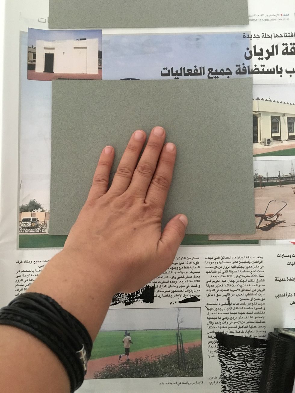 Flip over and massage the paper, pressing firmly.