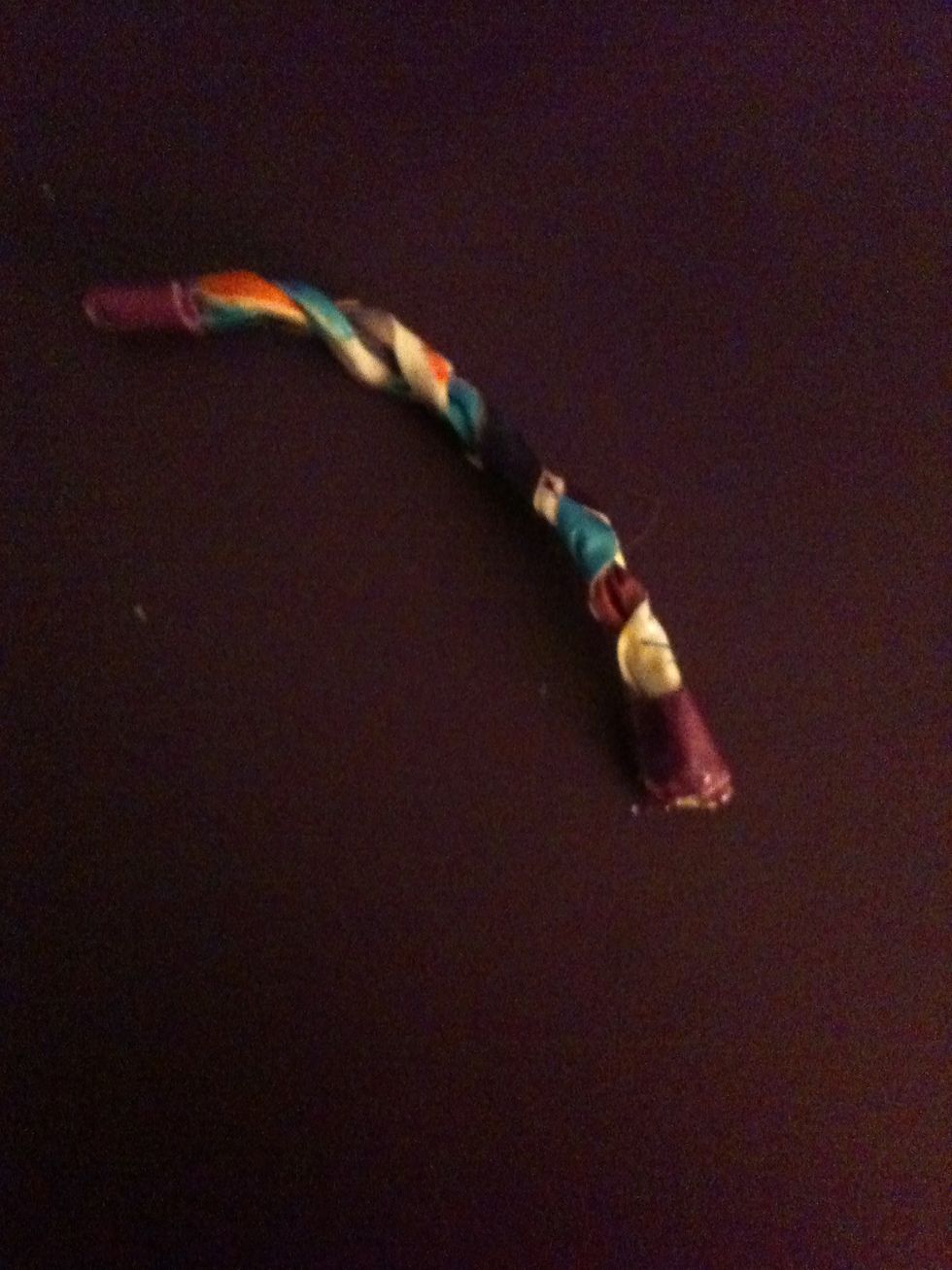 Flip over and redo loose braids. Tie off other end. Cut off the extra lengths of tape.