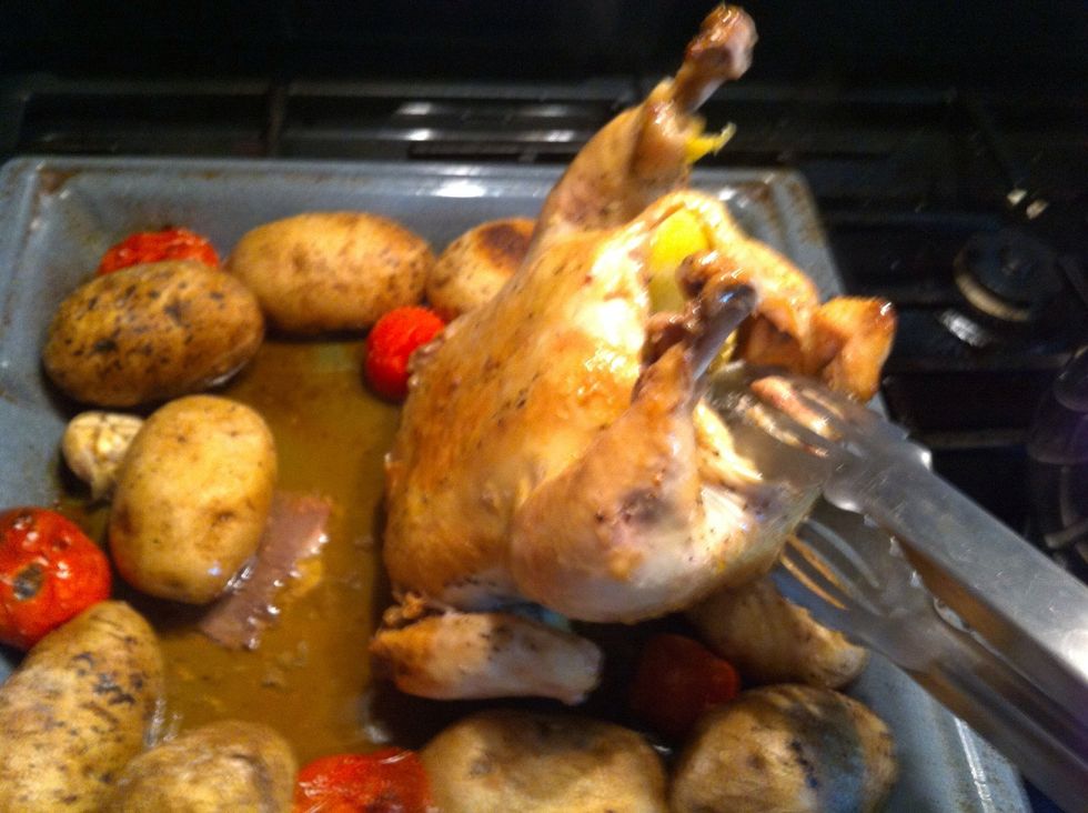 Flip over.  See all that juice in the bottom? It's a mix of fat drippings and those tomato's losing their juice. Creates a little sauna for my chicken.