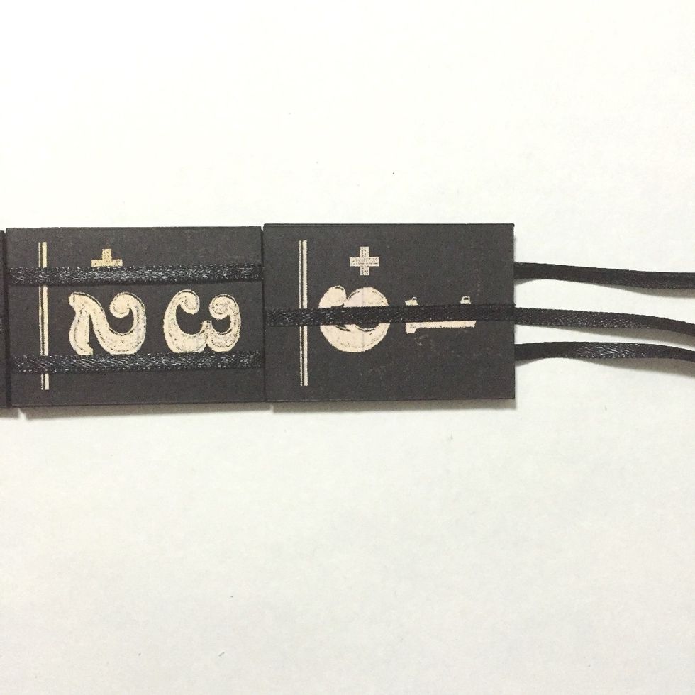 Flip over the 8th number block and glue it down onto the 7th number block... Pull the center ribbon to tighten when necessary...