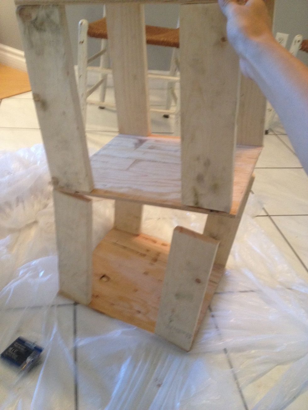 Flip over the part you just made and set the other half of the table on top of it.