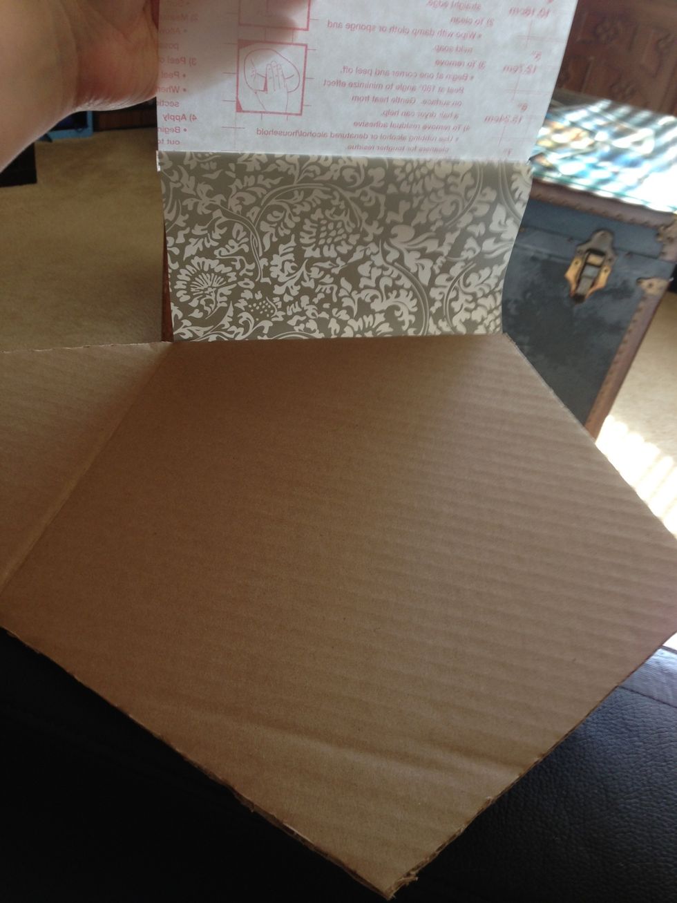 Flip over the whole keys and pull the rest of the contact paper onto the inside of the pocket.