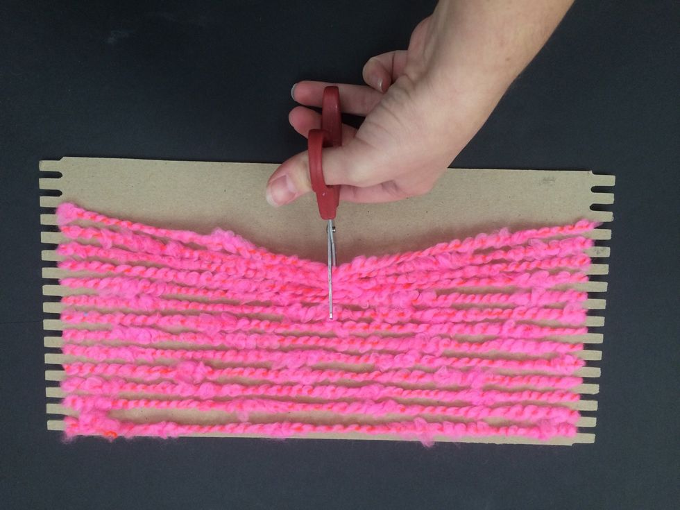 Flip over to the back and cut the yarn in the middle.
