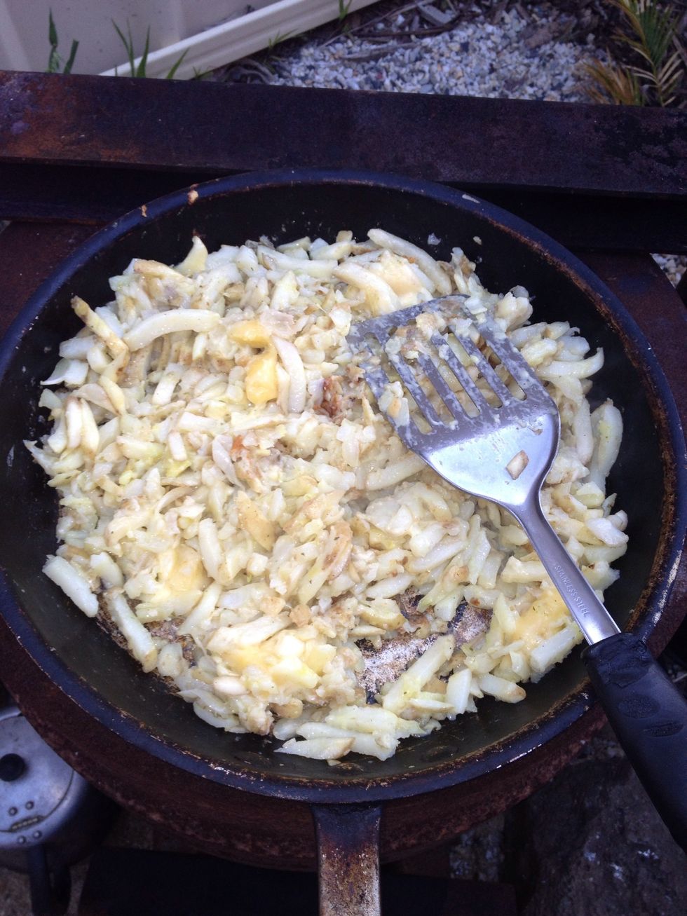 Flip portions of mixture constantly till cooked