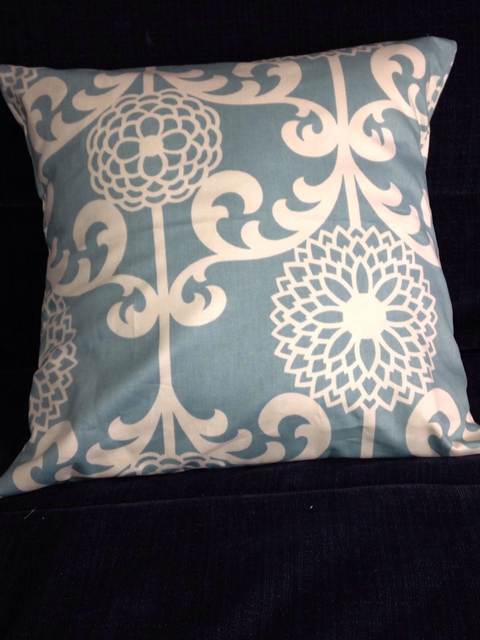 Flip that bad boy inside out and stuff the pillow inside.