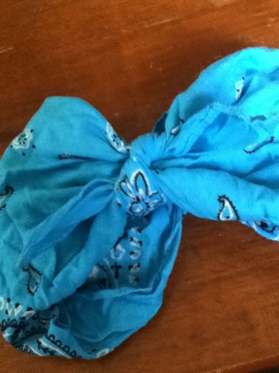 flip the bandana over and tie the corners on that side.