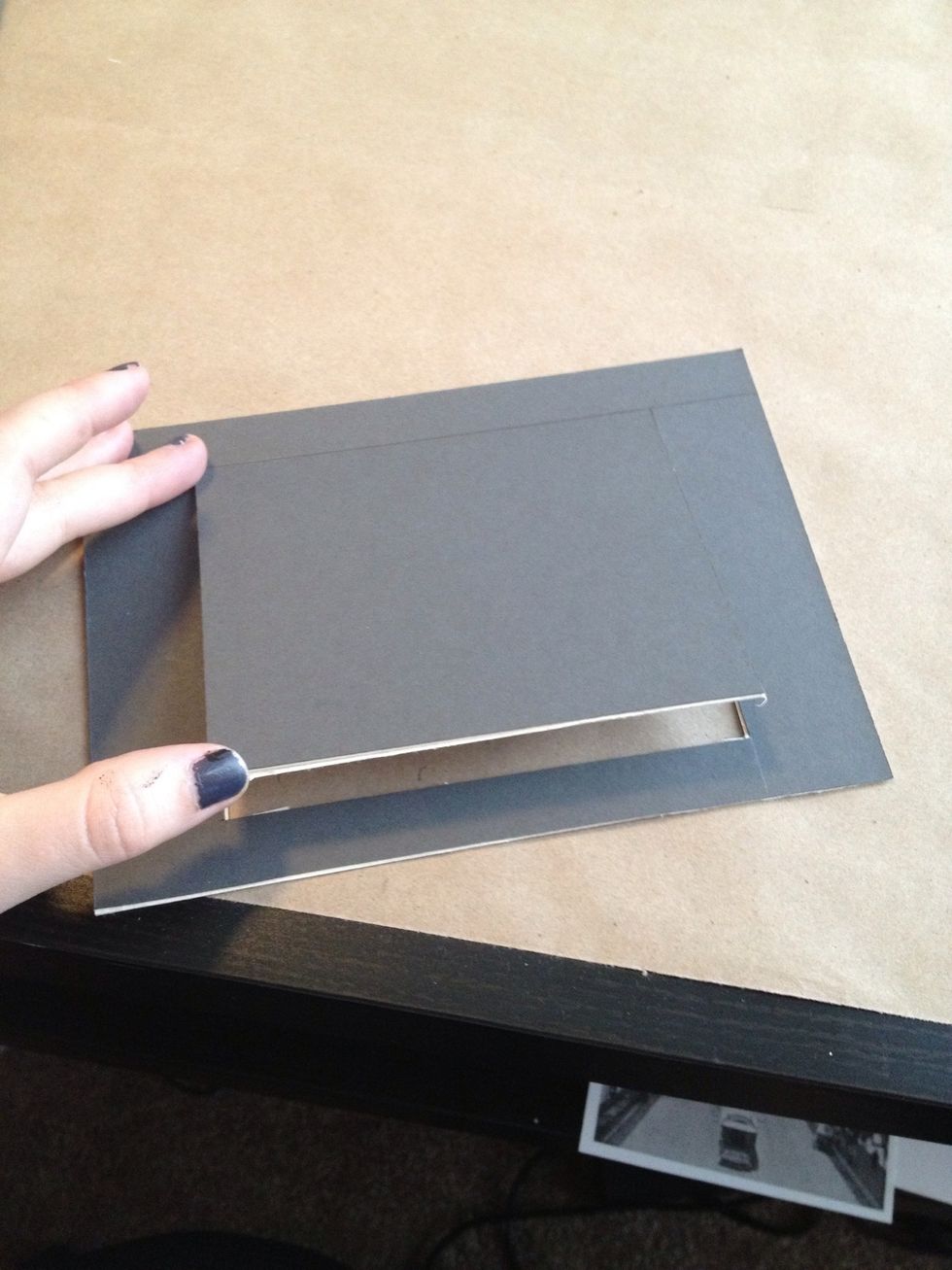 Flip the board over and do the same on the "face" side of the mat. When completed, the cut part of the board should pop out.