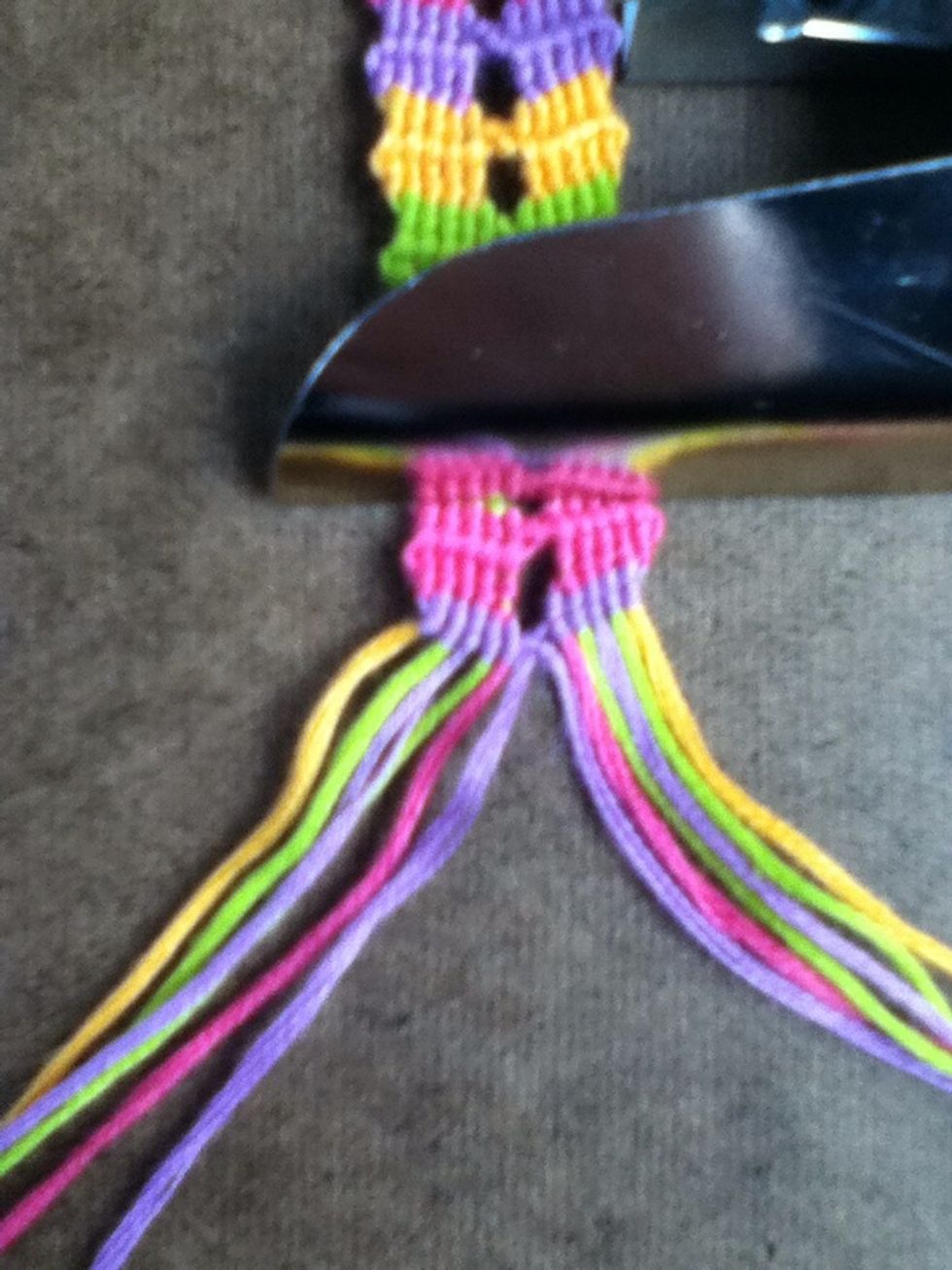 Flip the bracelet over.
