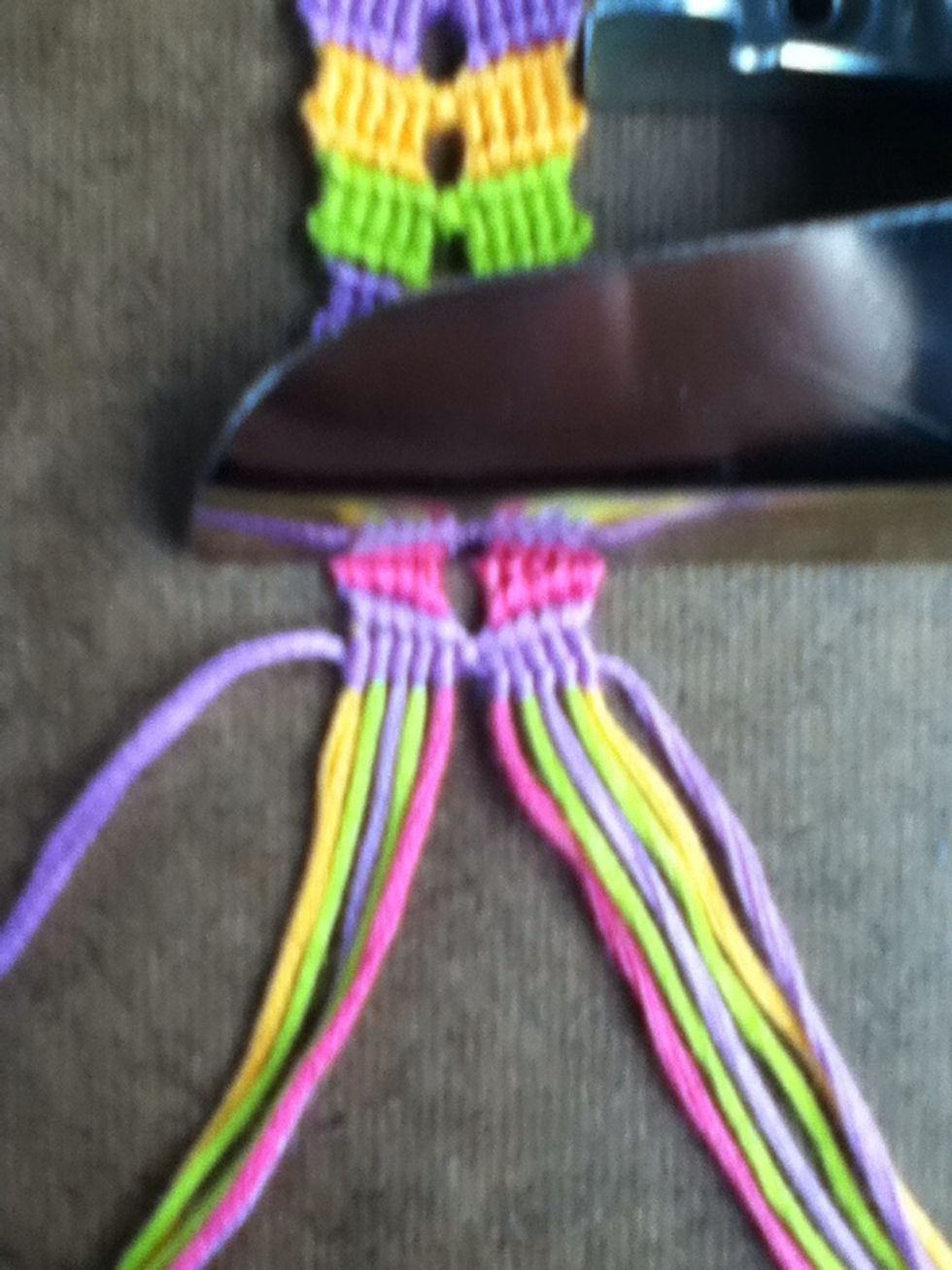 Flip the bracelet over.