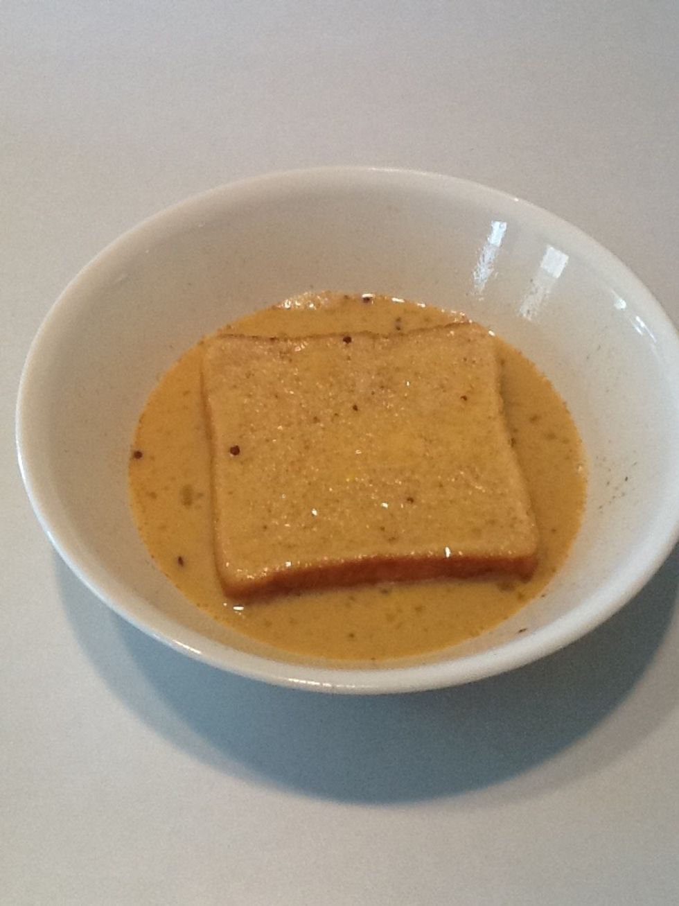 Flip the bread and do the same for the other side. Don't drown your bread or it will become too soggy.