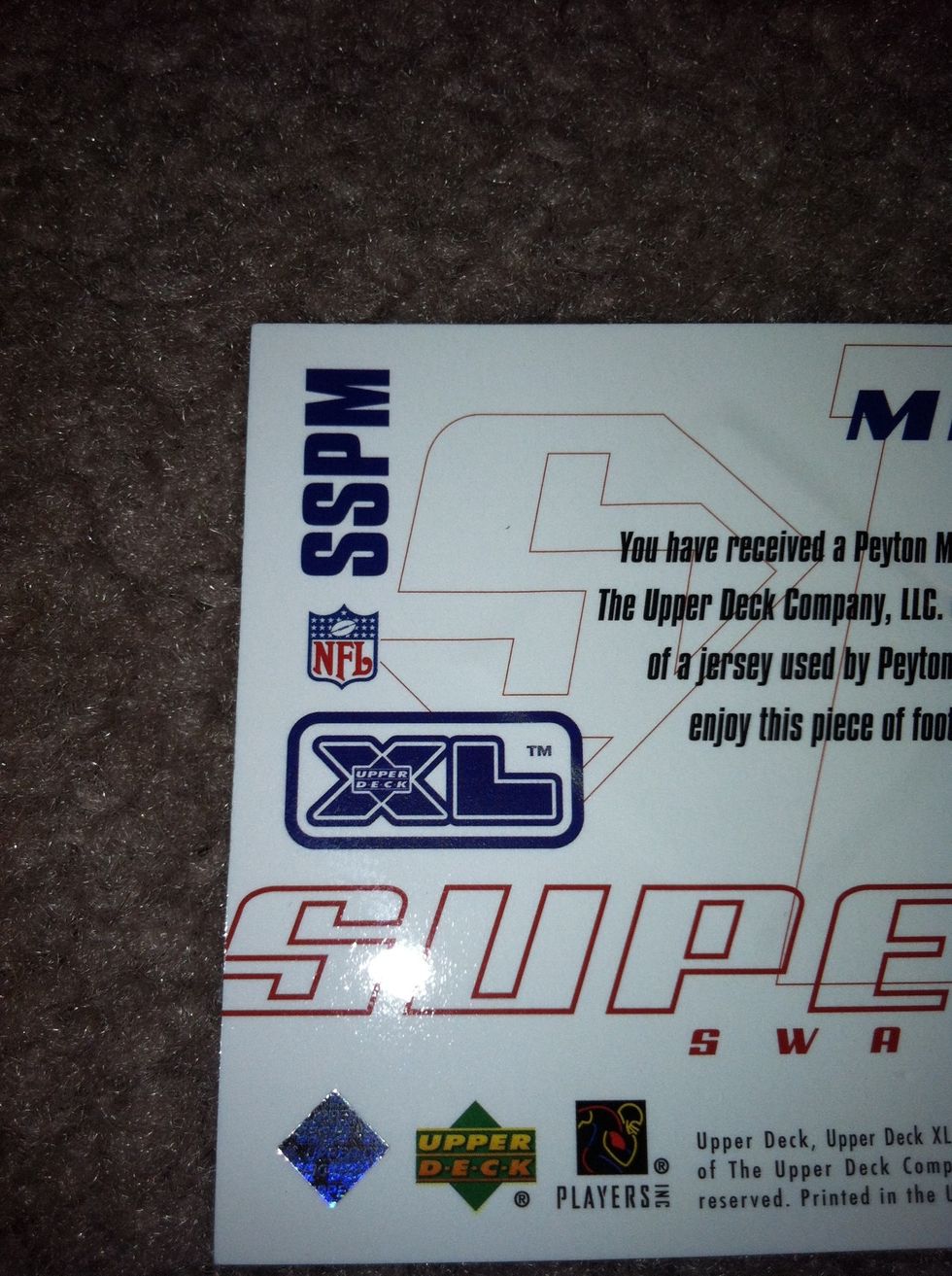 Flip the card one more time. Look in one of the corners (usually) for the number/letter of the card. This one just has the letters "SSPM". We will now look for "2002 upper deck XL super swatch" first.