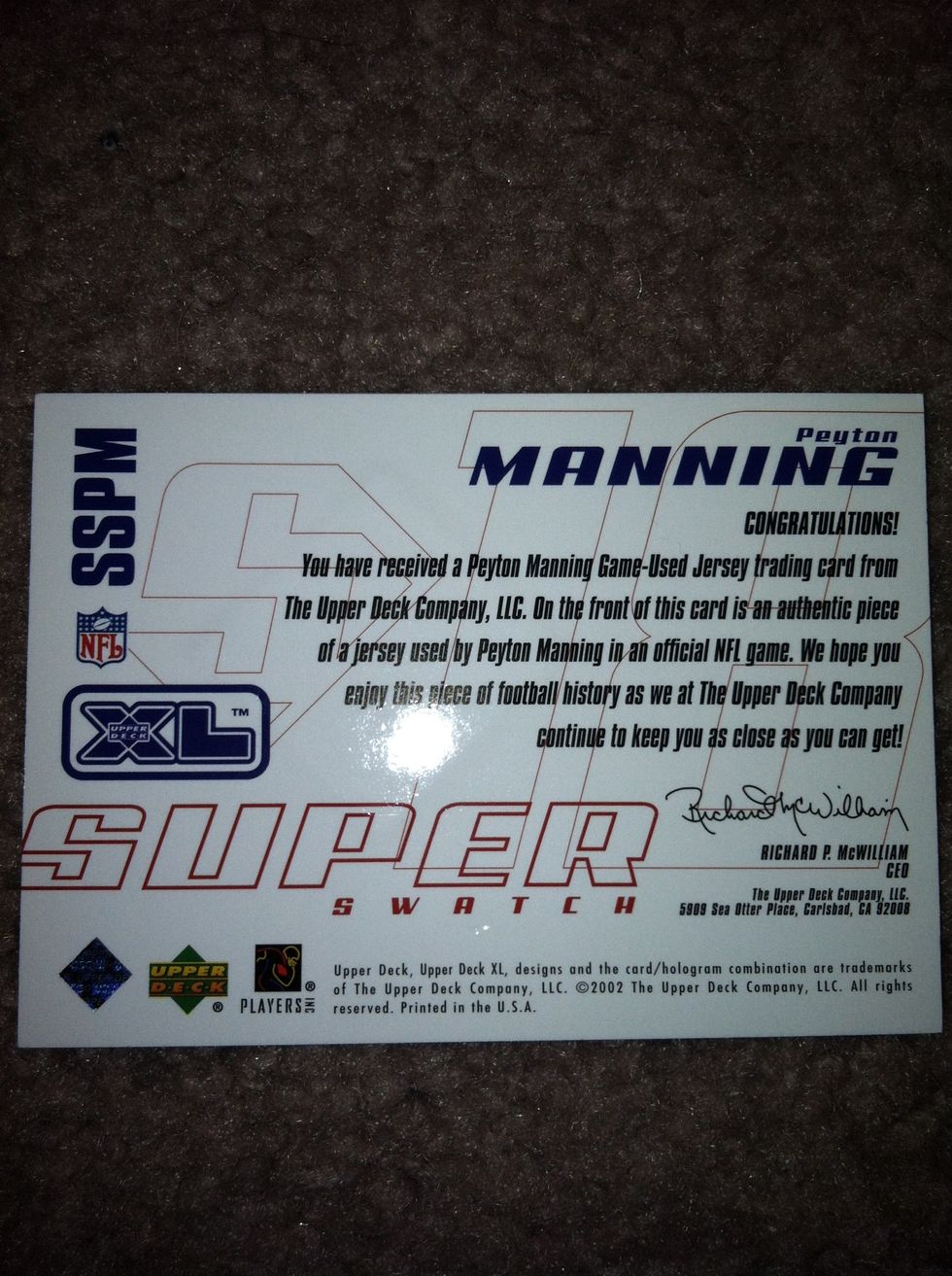 Flip the card over to the back and read the fine print on the bottom of the card. This will tell you the year of the set this card is in and the company that produced it.