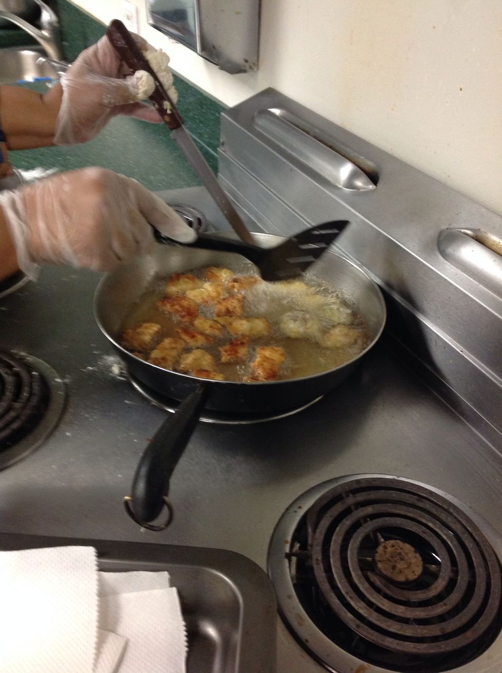 Flip the chicken over after one side is cooked