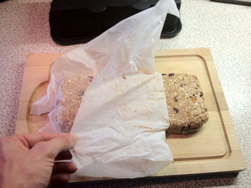 Flip the container and peel of the waxed paper