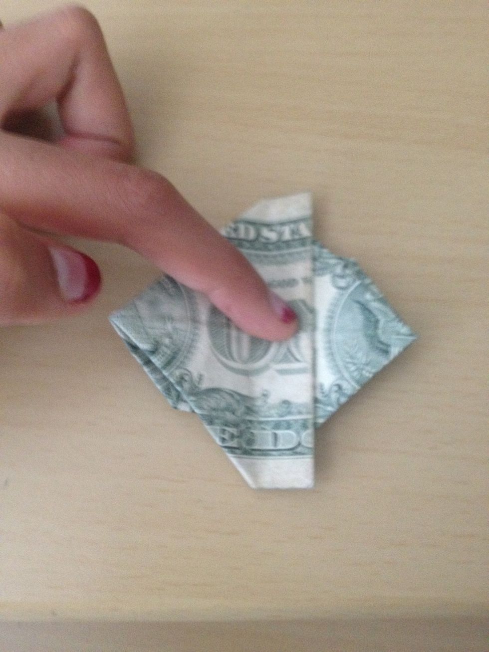 Flip the dollar over.