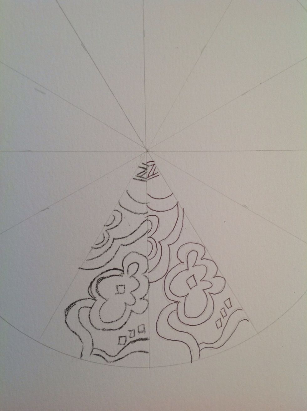 Flip the drawing face up and line up the pattern to the center tip and the edge of the pie. Trace with a pencil. It will leave a print of the pattern.