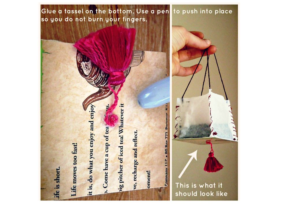 Flip the lantern over and find the center of the square. Hot glue a tassel to the center. Push the tassel securely into place with the end of a pen so you do not burn your fingers.