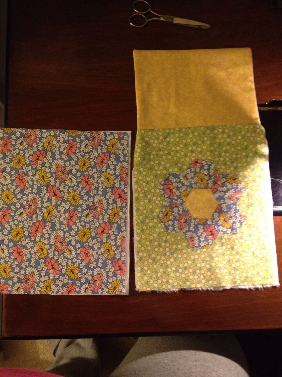 Flip the lightweight fabric of the front over the flannel and press the seam. You should have 2 pieces that look like this, backed with flannel.