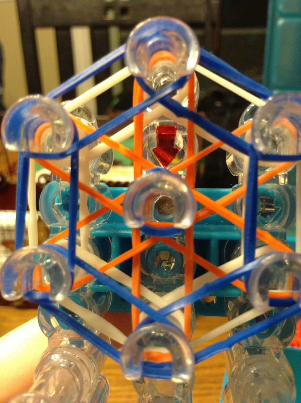 Flip the loom so the arrow is facing down or towards you.