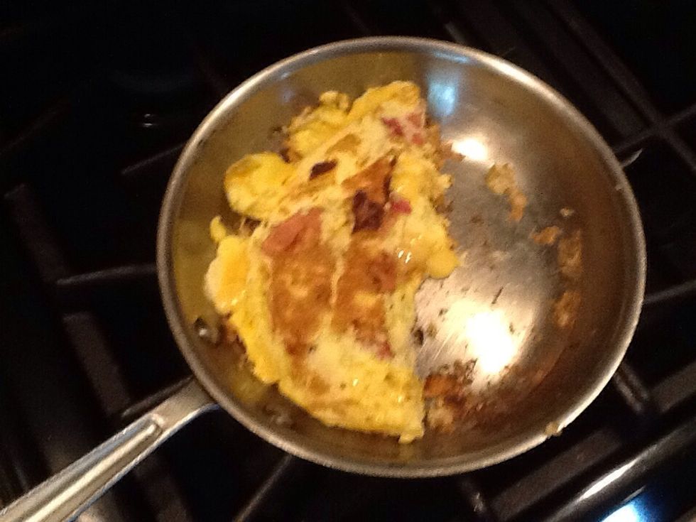 Flip the omelet over and let it cook for half a minute. I am not the best flipper hope you are better!