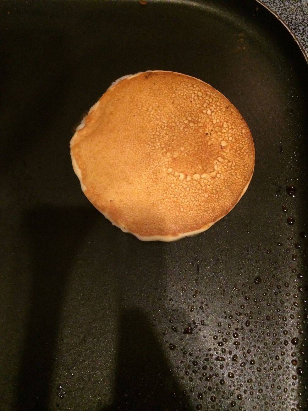Flip the pancake over and it should be a light or medium brown color. Let it cook for 15-30 seconds while the brown side is facing up. Then put it on a plate.