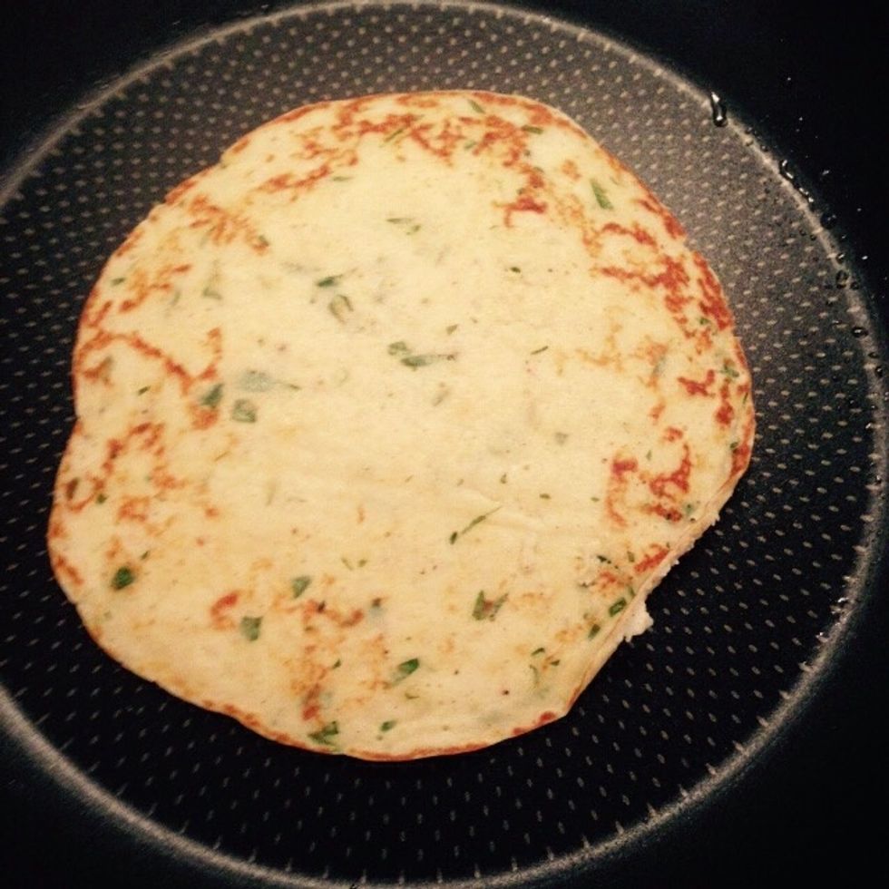 Flip the pancake to achieve browning on both sides and cook throughout. Make 8, pile up the cooked one in a plate and cover with a lid.