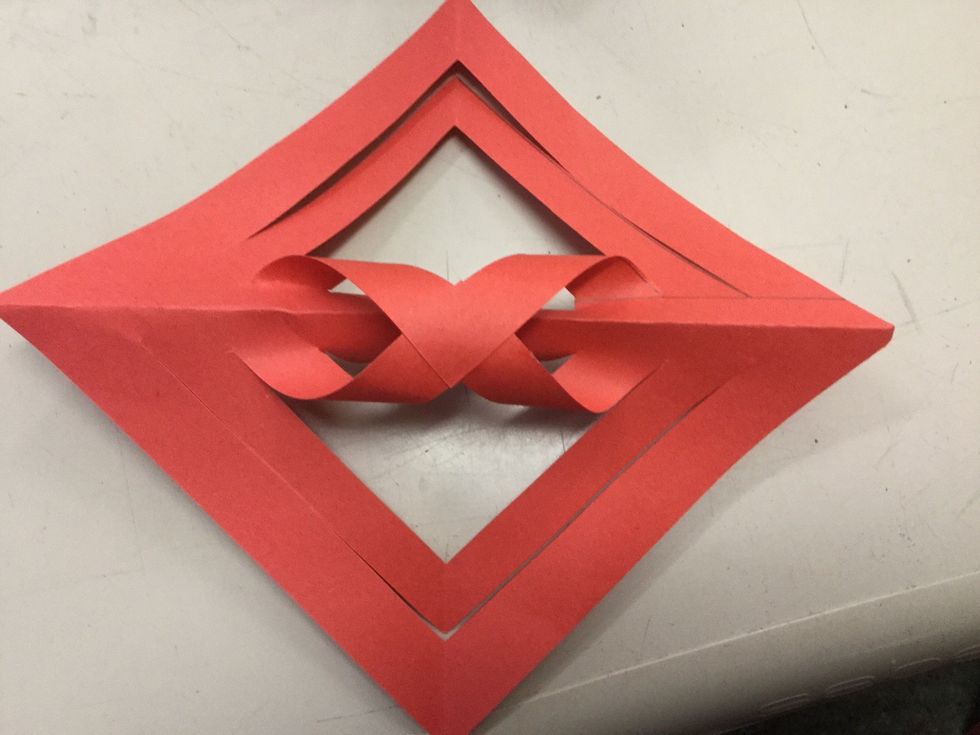 Flip the paper over and glue the flap together