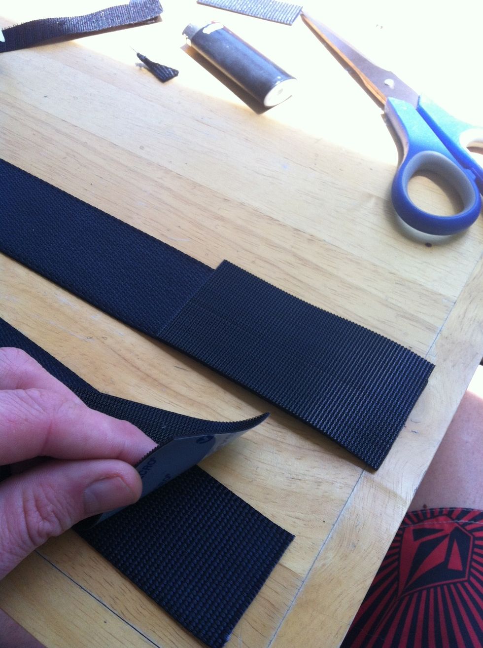 Flip the straps over and put hook sides of Velcro on solid end as well as tabbed end.
