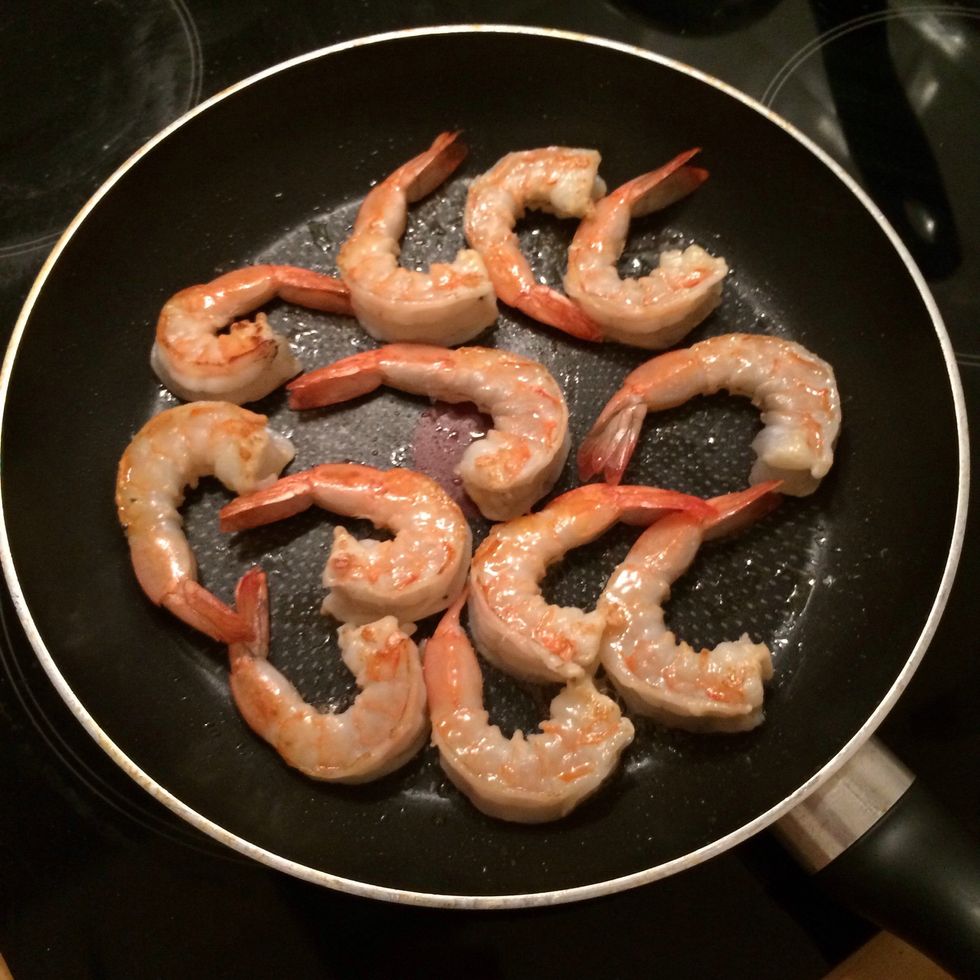 Flip them after a minute and sprinkle with a pinch of salt. Cook for one more minute.