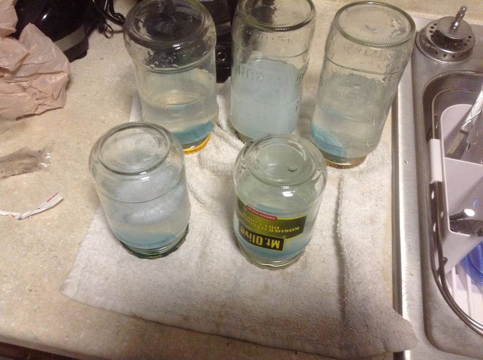 Flip them upside down after you have shook them all, i have slacked a little and let my collection stack up