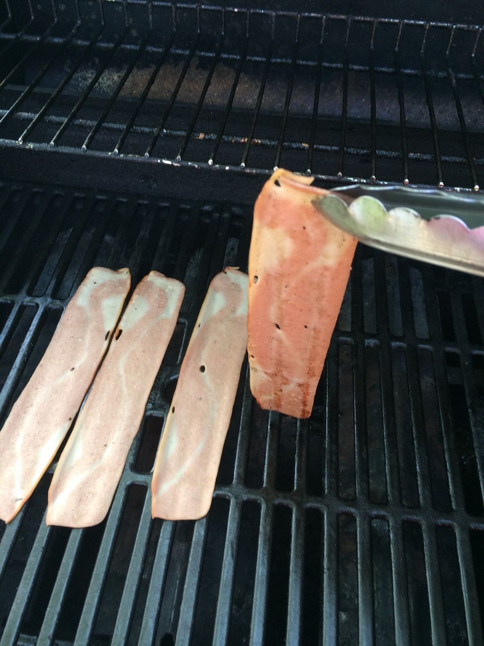 Flip your bacon regularly to make sure it doesn't burn and turn black \ud83d\ude1e