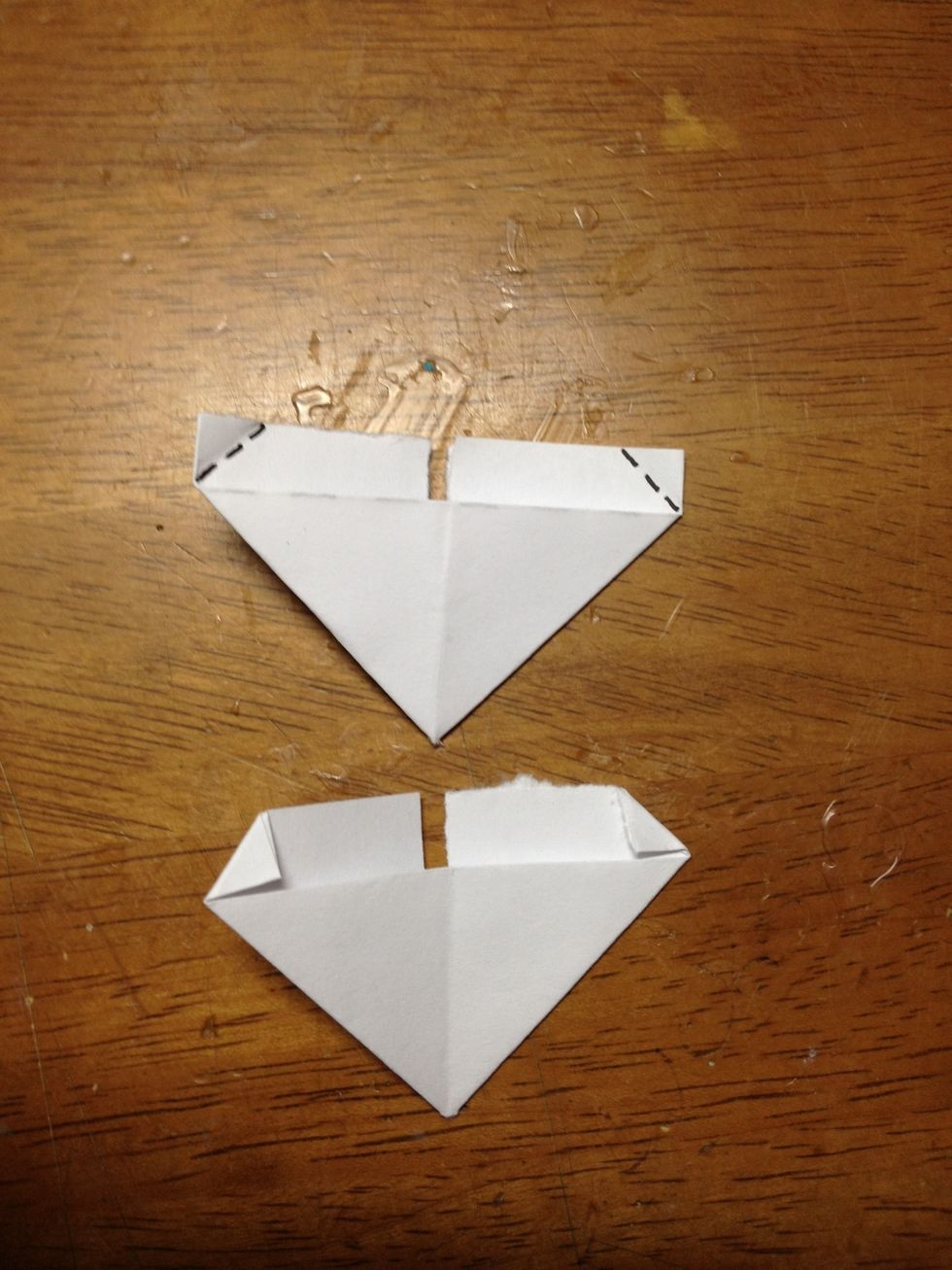 Flip your piece over and fold the corner part down along the dotted line.