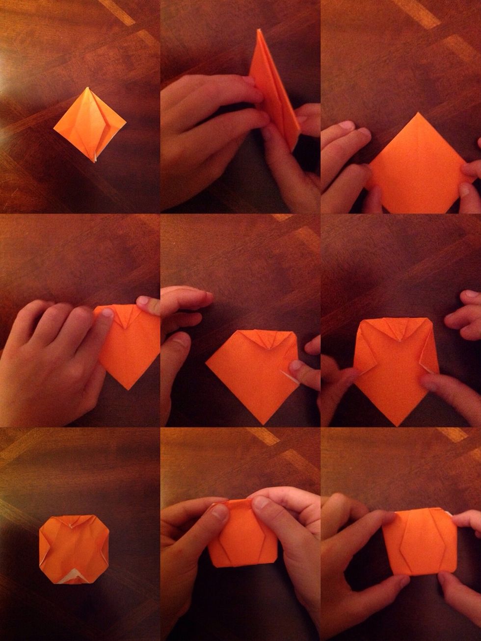 Flip your square over and fold down the four corners to give the pumpkin it's round shape. Flip it back over.