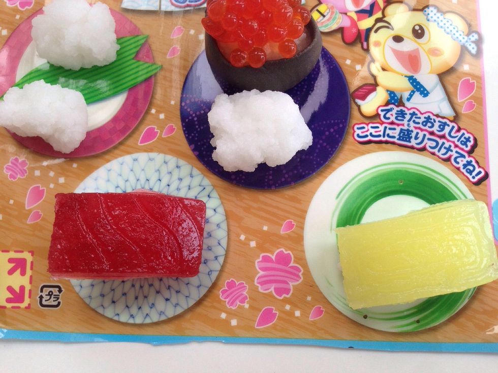 Flip your Tuna and Tamago over to reveal the realistic lines that are in Tamago and Tuna Sushi and Top Your Rice Ball