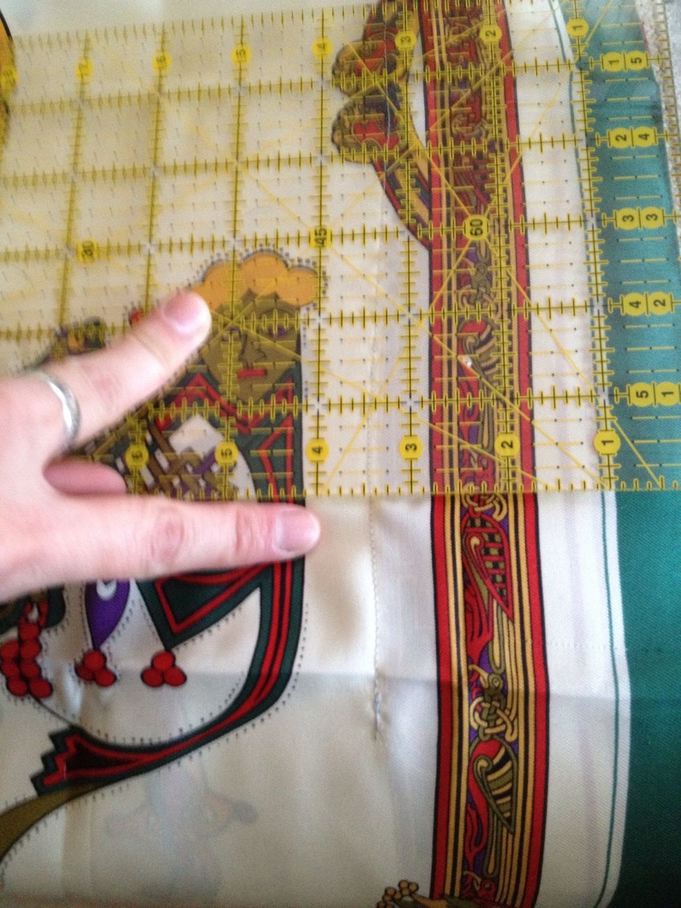 Flipping so the right sides are out. Measure how tight you want the shirt to be. Pin, then sew a straight line.