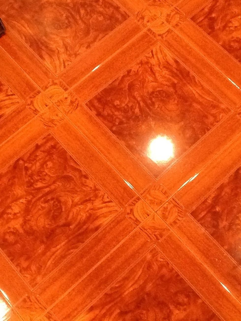 Floor after.. Purchased at a wholesale store. Ceramic tile, burl wood pattern. This was probably the most costly part of the salon.