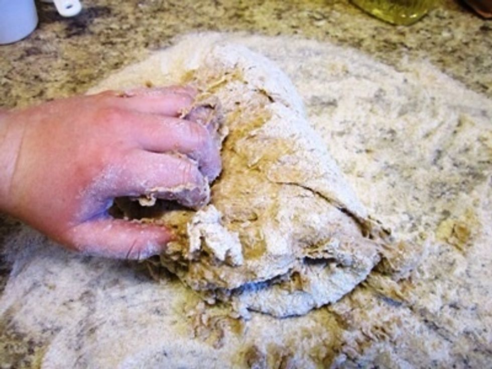 ...Flop it on top of the other side, folding the whole thing in half...