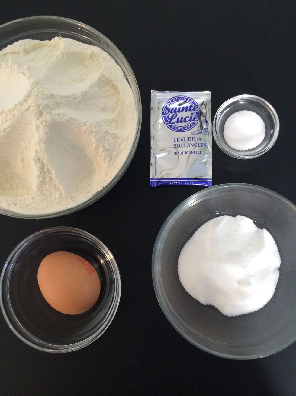 Flour 500g + sugar 80 g + 1tsp salt+ 8 g instant yeast + 1 large egg (65 g)beaten - omelette.  Mix all the dry ingredients add the warm milk stir. Beat the egg add. Mix knead 10 mins(5  in a mixer)