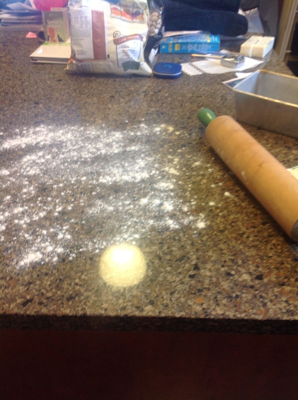 Flour a clean flat surface...I use my quartz counter top. Flour your rolling pin too so it doesn't stick