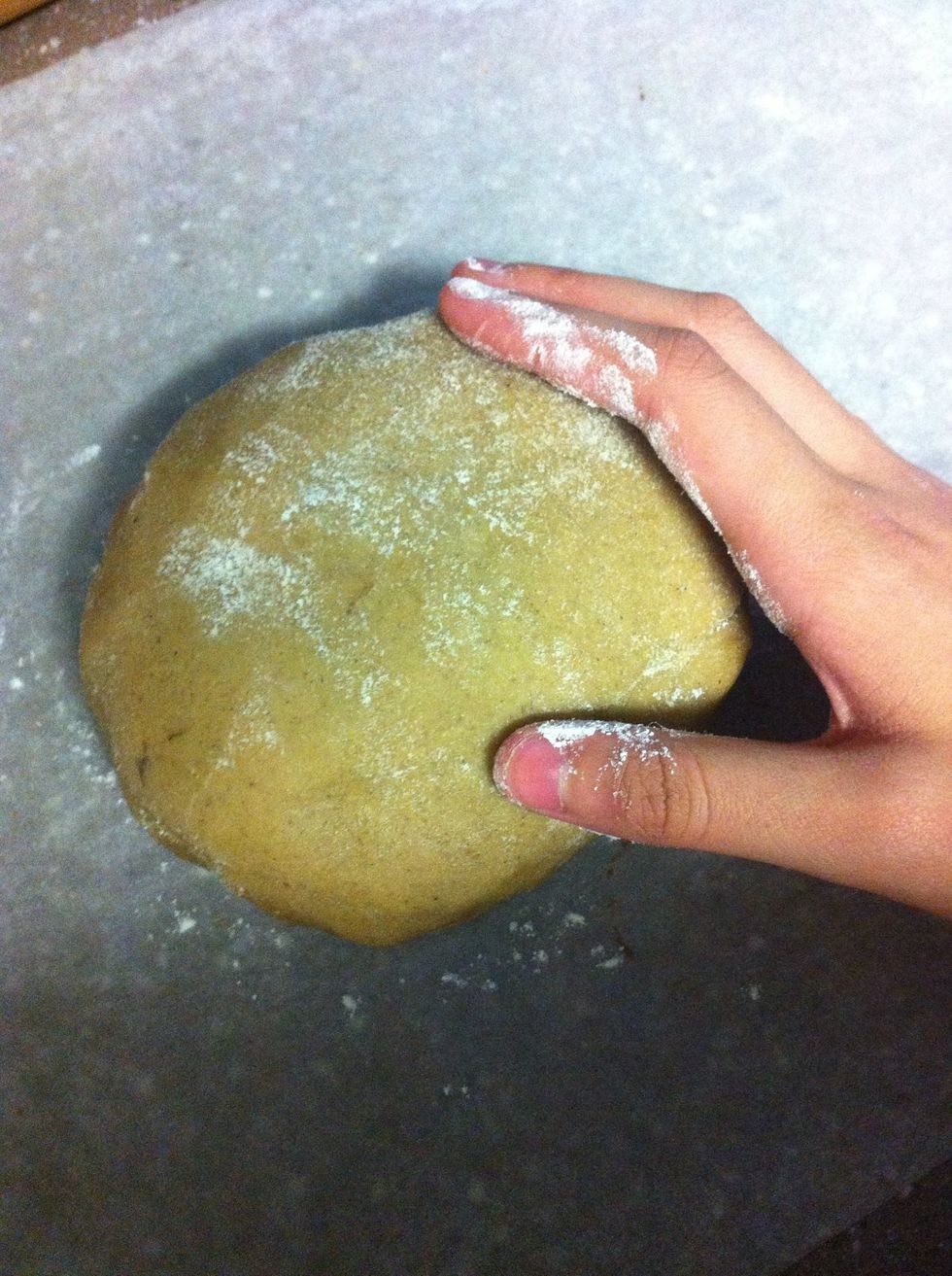 Flour the dough, your hands and your working surface