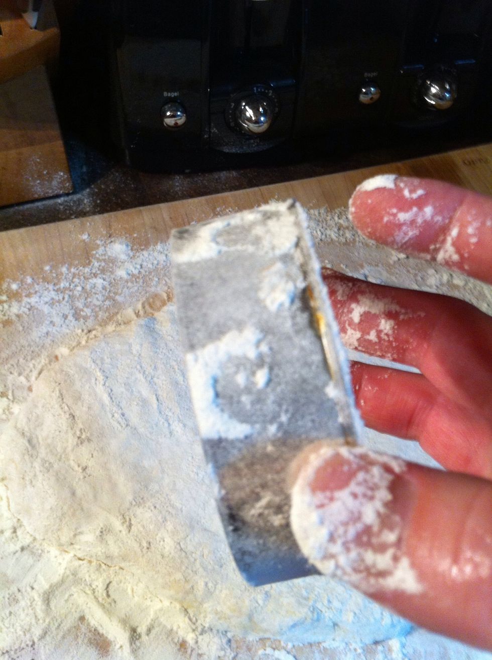 Flour your biscuit cutter. I've been known to just use a glass.